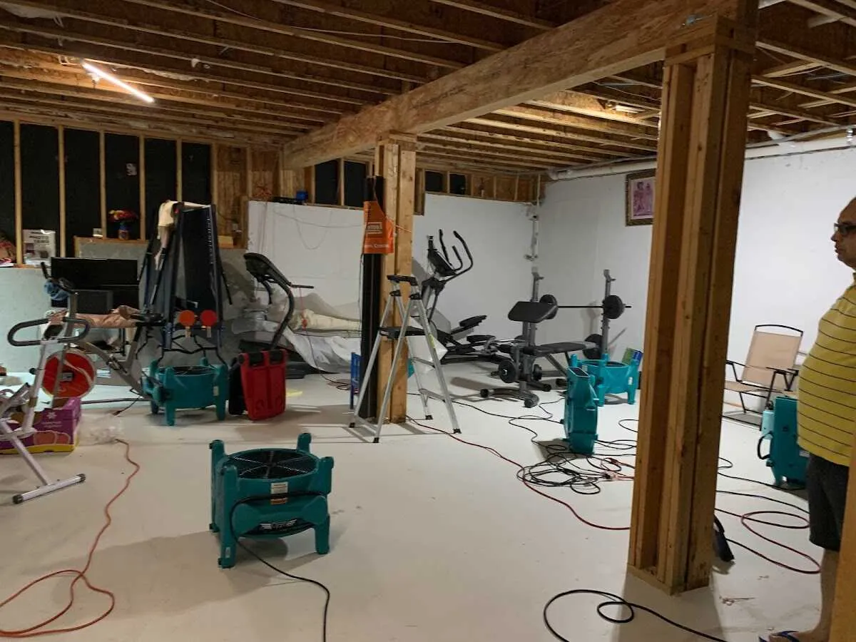 Basement drying equipment setup for Contents Cleaning & Restoration in Fort Atkinson